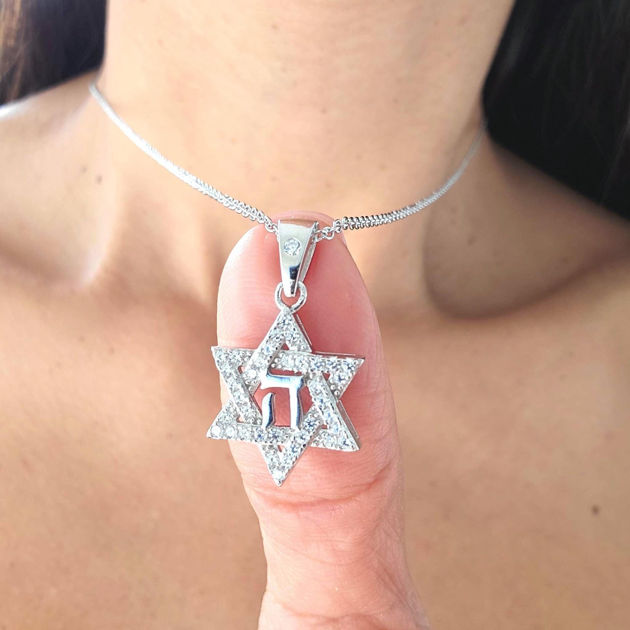 This YHWH Necklace is a powerful expression of faith, featuring the Hebrew Tetragrammaton יהוה (Yahweh) in a sterling silver pendant. A significant piece of Judaica jewelry.